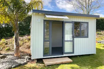 A cabin used by an orchard as a site office